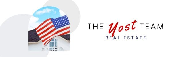 Home with US Flag In Front with the Yost Team Real Estate